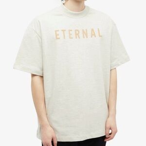 Essentials Fear of God Oatmeal T-Shirt with Gold 'ETERNAL' Print
